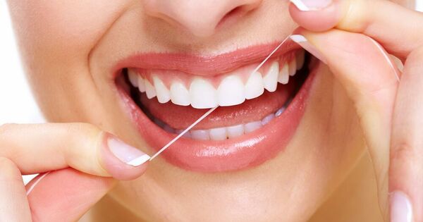 beneficios-salud-bucal-usar-hilo-dental.jpg